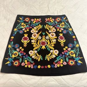 Black floral mini skirt